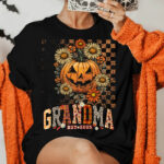 grandma est 2025 halloween pumpkin and floral fall shirt 1.jpg